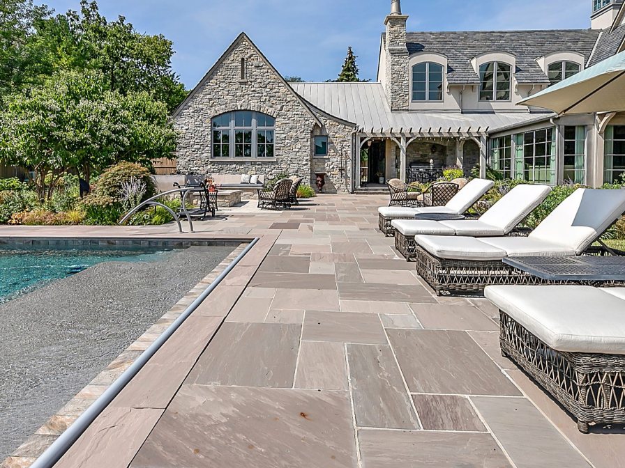 A residential project from the redesigned site: stone house and pool terrace
